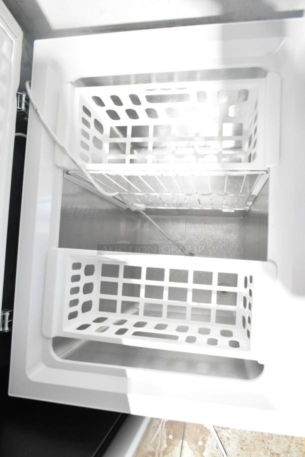 Brand new 2025 Magic Chef HMCF5W4 chest freezer, 5.0 cu. ft., scratch and dent, 115 volts, 1 phase, interior shown.