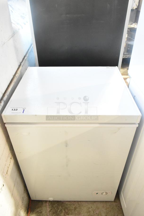 Brand new Magic Chef HMCF5W5 chest freezer, 5.0 cu. ft., manual defrost, visible cosmetic dents, 115V, 1 phase. Auction tag: 133.