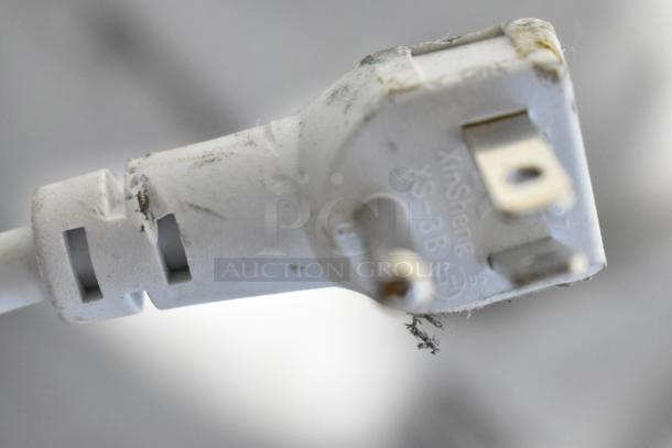 Close-up of a slightly damaged plug for the 2024 Vissani HMCF5W5 chest freezer by Magic Chef. Plug shows minor wear.