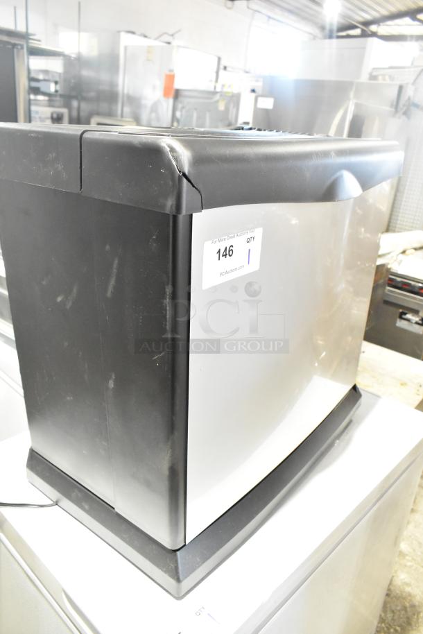 HD1409 Evaporative Humidifier, 120V, 1 Phase. Black and silver body with visible scuffs; auction label shows item number 146.