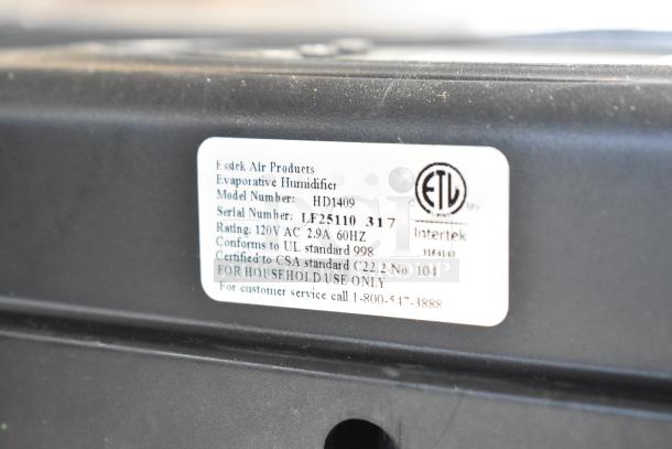 HD1409 Evaporative Humidifier with label showing model, serial number LF25110 317, 120V AC, UL, CSA certifications.