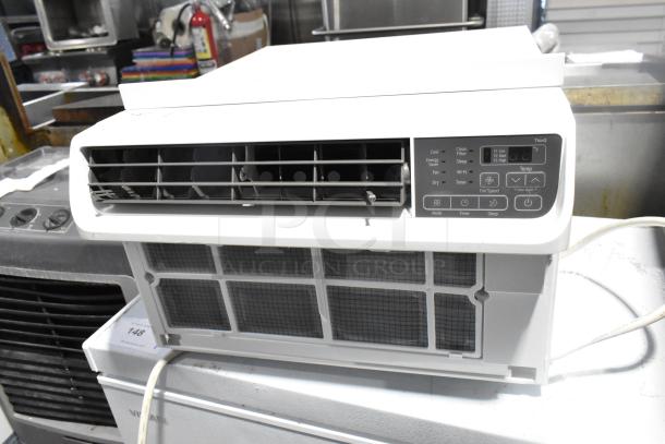 LG LW1022IVSM window air conditioner, 10,000 BTU, 115 volts, control panel visible, apparent good condition.
