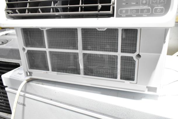 LG LW1022IVSM Window Air Conditioner, 10,000 BTU, 115 Volts. Features control panel, vents, and rear filter. Good condition.