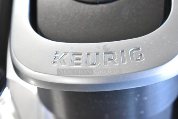 Keurig K-4550 single cup coffee machine. Silver finish, model branding visible. 120V, 1 phase, countertop design.