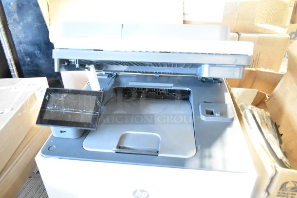 HP Color LaserJet MFP 3301sdw scanner, copier, printer with open top, showing paper feeder. Good condition.