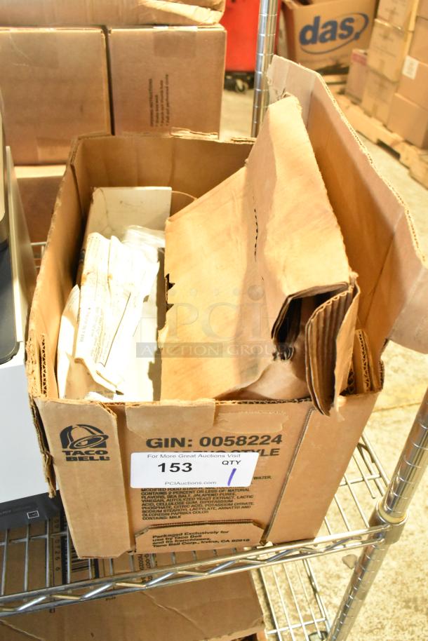 Box containing Ingersoll-rand 4041, Norton 1601 door closer, visible labels, moderate wear, ideal for parts or use.