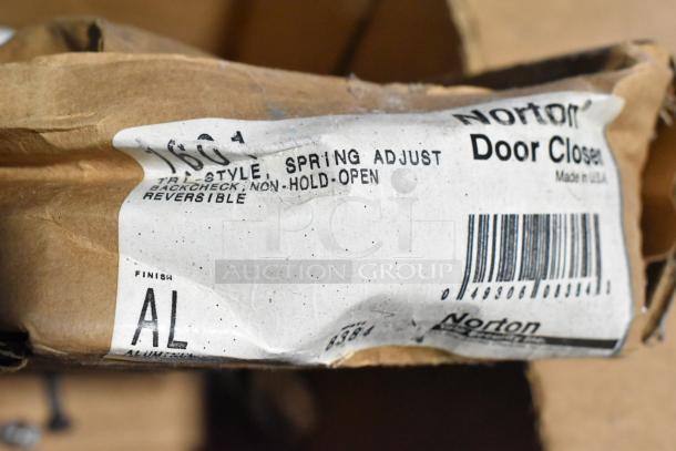 Box with Norton 1601 Door Closer label, spring-adjust feature, aluminum finish; includes Ingersoll-rand 4041.