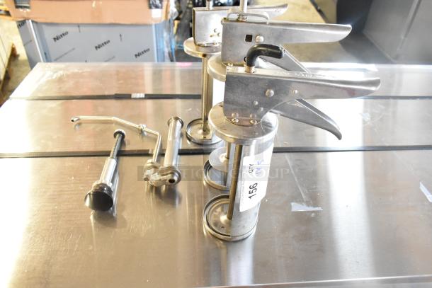 Five various metal tools including two caulking guns and a pump piece, showing light wear, with auction tag "960".