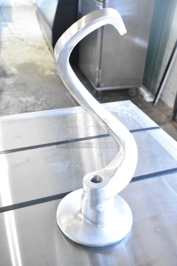 Commercial dough hook for Hobart mixer; sturdy metal, excellent condition, fits standard models, functional design.