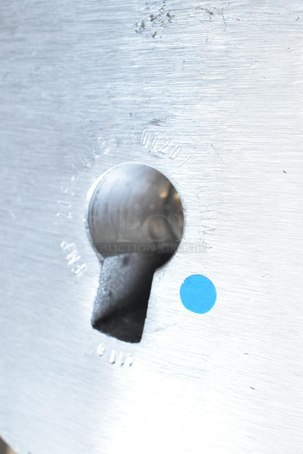 Commercial dough hook attachment for Hobart mixer, silver metal, visible engraving with part number and blue dot marking.