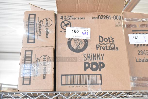 Boxes of Dots Skinny Pop Pretzels and LavAzza Vanilla Latte Beverage Mix, brand new with scratch and dent.