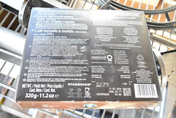 Box of Starbucks Nespresso capsules, 320g, showing labels with details on origin, weight, and best before dates.