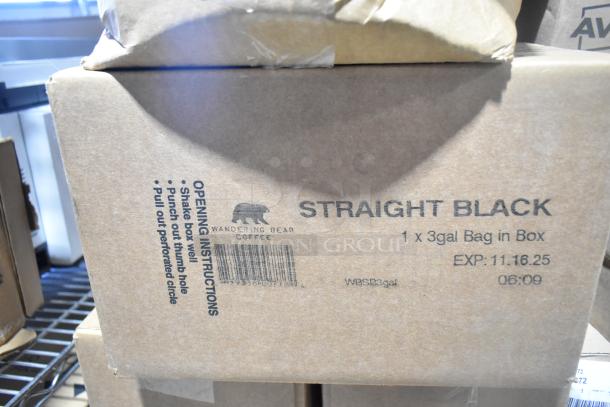 Box of Wandering Bear Straight Black Coffee, 3-gallon bag-in-box with opening instructions and expiration date 11.16.25.