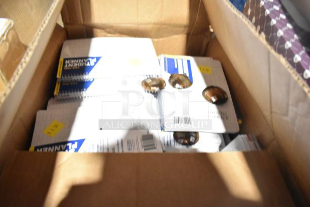 Box with planners labeled "Student Planner," spiral-bound, in cardboard boxes. Includes scratch and dent items.
