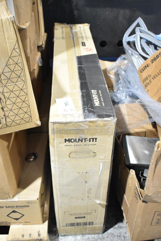 Brand new Mount-it MI-7926 standing desk converter in original packaging with slight box wear.