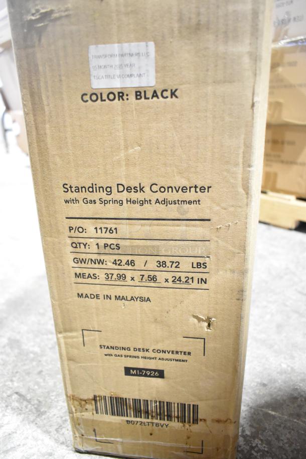 Mount-it MI-7926 standing desk converter box, black color, brand new scratch and dent, gas spring height adjustment, made in Malaysia.