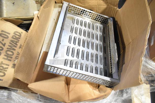 Stainless steel drop-in bin in cardboard box, featuring gridded sides and slotted base, part of 25 various items lot.