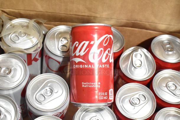 Case of Coca-Cola and Diet Coke cans, 7.5 fl oz, original taste. Includes multiple items in good condition.