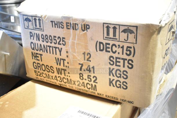 Cardboard box labeled with P/N 989525, quantity of 12 sets, net weight 7.41 kgs, gross weight 8.52 kgs, dimensions 52x43x24 cm.