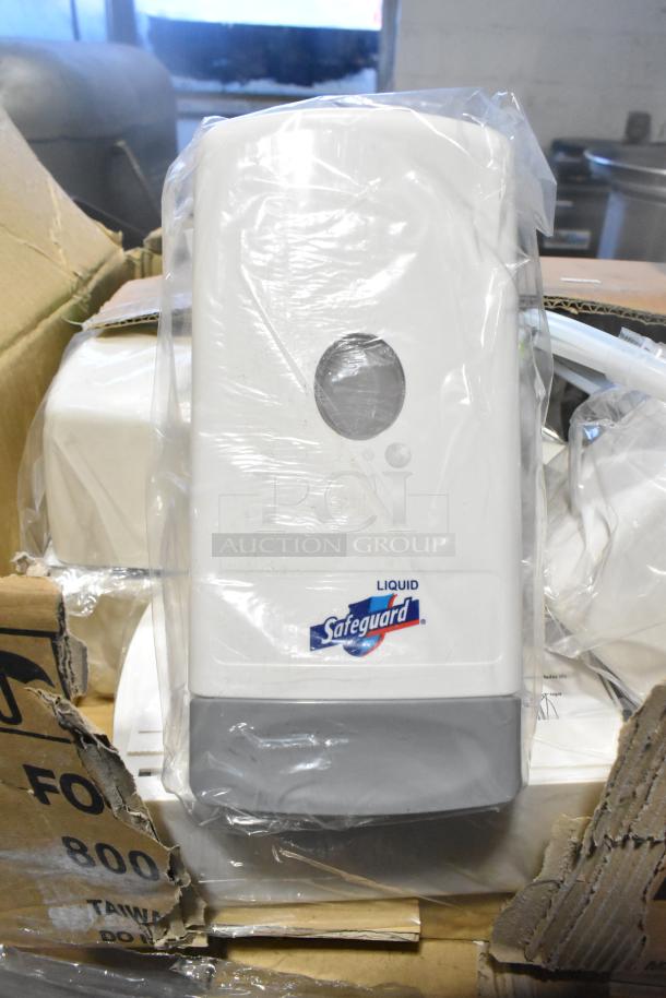 Sealed Safeguard liquid soap dispenser, white, brand new in box. Included in 75-item scratch and dent auction lot.