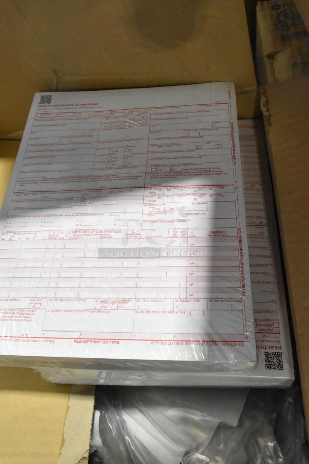 Box of health insurance claim forms in new condition, labeled "Health Insurance Claim Form 1500" with QR code visible.