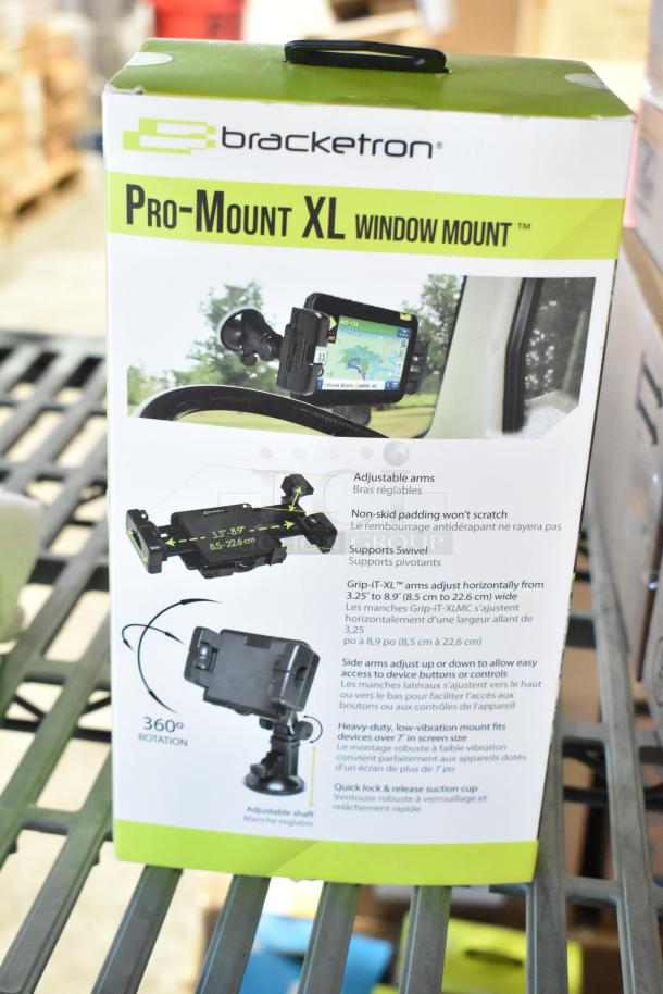 Bracketron Pro-Mount XL Window Mount Phone Mount in original packaging, features adjustable arms, non-skid padding, 360-degree rotation.
