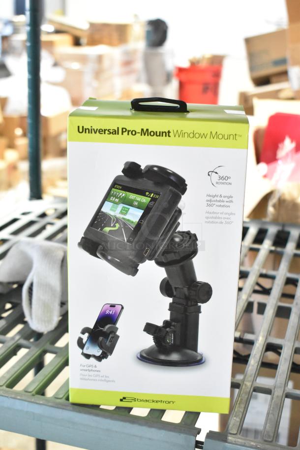 Bracketron Universal Pro Mount Window Mount in box, features 360° rotation. New condition, suitable for GPS and smartphones.