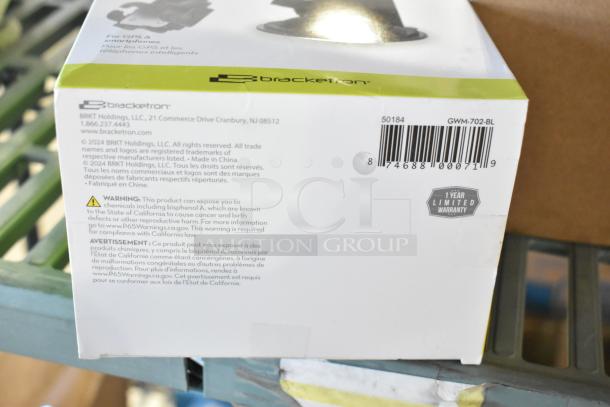Bracketron Universal Pro Mount, new condition, boxed. Scratch and dent sale, visible warranty label, and safety warning details.