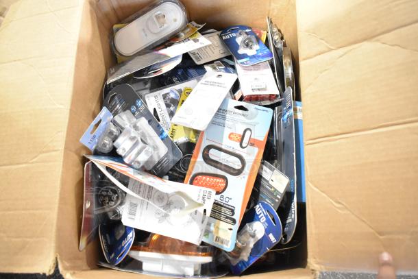 Box of 179 brand new scratch and dent items, includes coax cable, roadside emergency beacon, hose clamps, various brands.