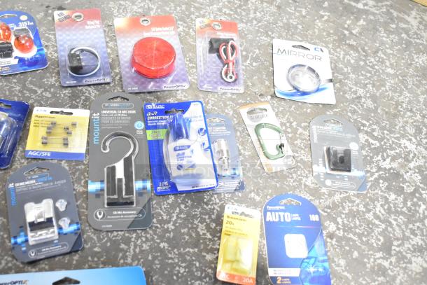 Auction lot of 248 brand new scratch and dent items, includes flush mount grommet, bulbs, and lamps, in original packaging.