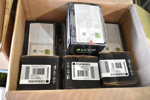 Seven new scratch and dent LCCP C540A1KG ink cartridges in box.