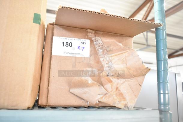 Box of 7 brand new scratch and dent items with LCCP C540A1KG ink, marked "QTY x7," visible on a shelf.