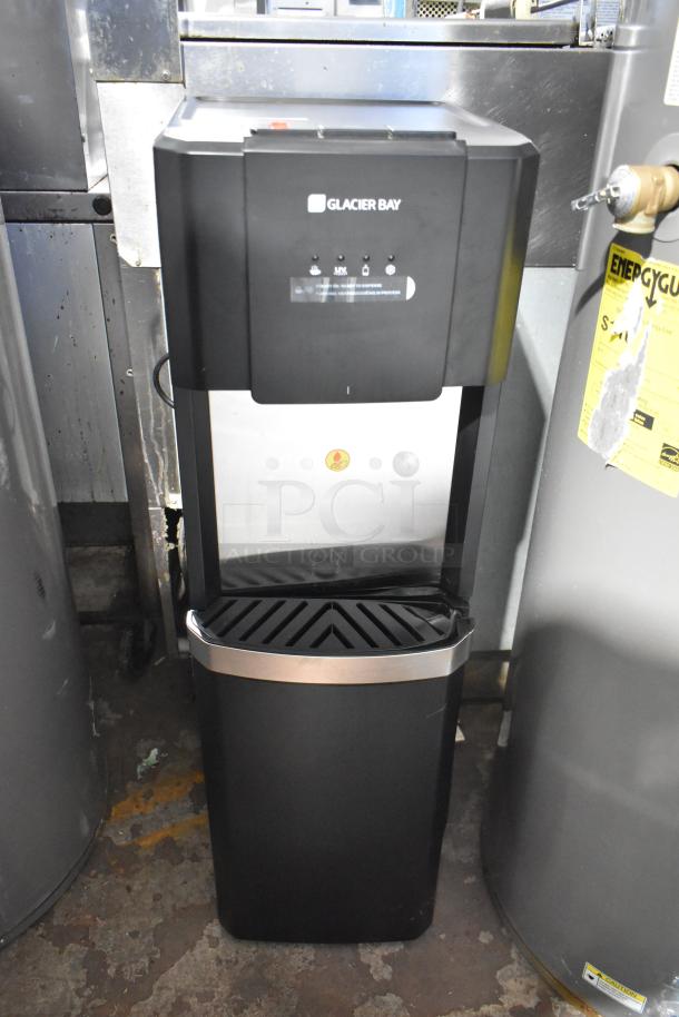 Glacier Bay LY619 water dispenser, matte black and stainless steel, bottom load. 115 volts, 1 phase. Appears in good condition.