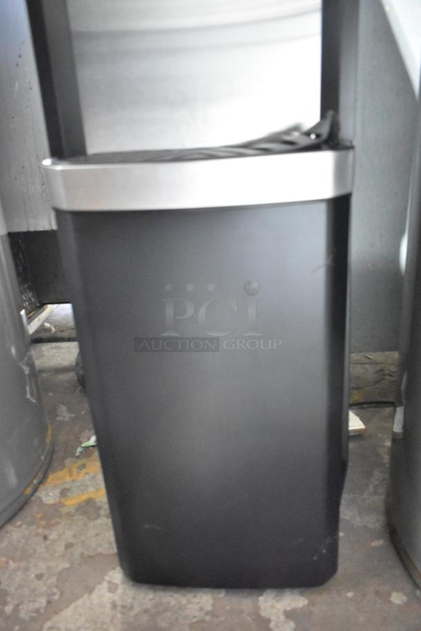 Glacier Bay LY619 bottom load water dispenser, matte black, stainless steel, 115 volts, 1 phase. Minimal wear visible.