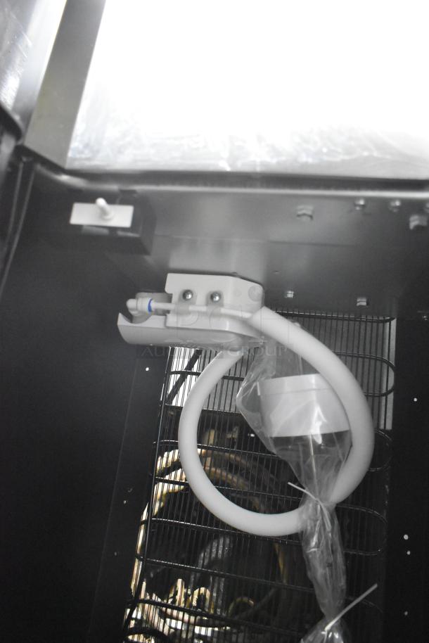 Glacier Bay LY619 bottom load water dispenser in matte black and stainless steel. Interior view showing tubing and components. 115V, 1 phase.