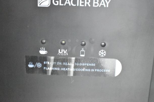 Glacier Bay LY619 water dispenser in matte black and stainless steel. Bottom load, 115V, 1 phase. Visible controls for heating, UV, cooling.