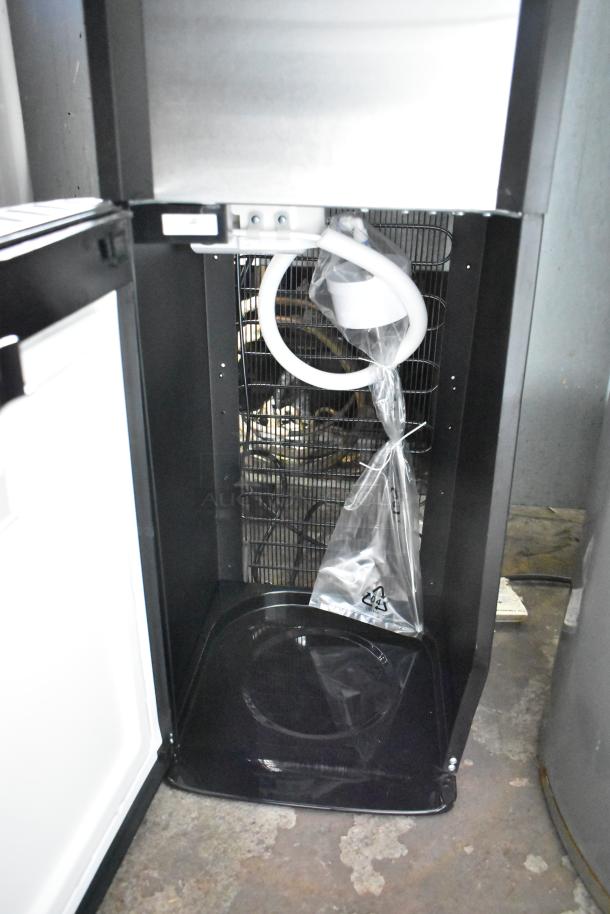 Glacier Bay LY619 bottom load water dispenser, matte black and stainless steel, 115 volts, 1 phase, open compartment view.