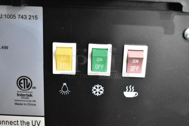 Glacier Bay LY619 water dispenser controls, featuring yellow, green, and red on/off switches. ETL listed, made in China.