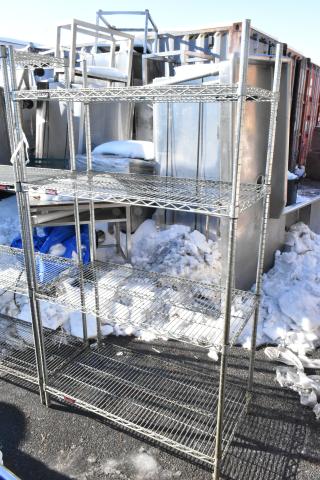 Chrome finish 4-tier wire shelving unit, outdoor setting, dismantling required by buyer, consider freight charges.