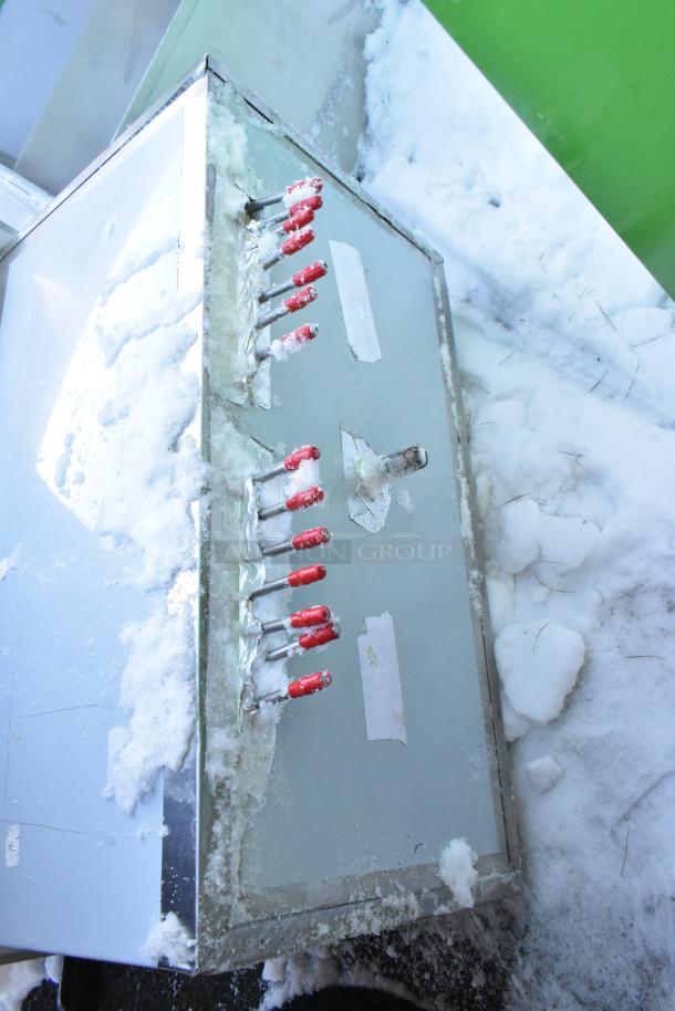 Brand new Regency 18"x30" stainless steel drop-in ice bin with 7 circuit post-mix cold plate, shown with frost.