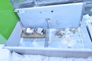 Regency 2 Bay Sink, brand new, showing scratches and dents. Includes attached packaging and labels. Ideal for commercial use.