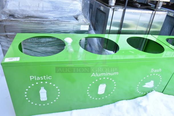 Green recycling bin shell with three labeled trash deposit holes for plastic, aluminum, and trash. New, scratch and dent condition.