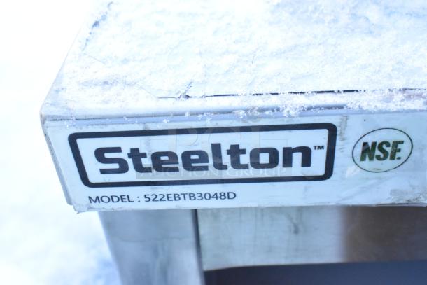 Steelton 522EBTB3048D work table, brand new scratch and dent, NSF certified, features label on corner.