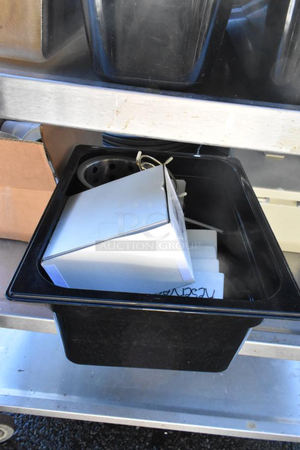 3-tier cart with commercial casters, includes a colander and poly drop-in bins, in good condition.