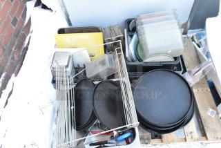 Pallet lot with serving trays, poly drop-in bins, fry basket, and utensils. Items appear used. Includes storage crates.