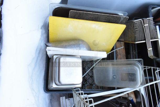 Pallet lot of assorted kitchen items; includes serving trays, poly drop-in bins, fry basket; various materials and sizes.