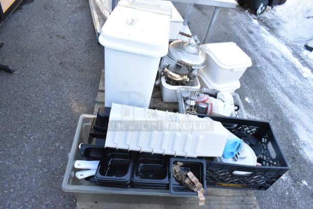 Pallet lot with ingredient bin, various poly bins, serving spoons, and spatulas. Items appear in good condition. Labels visible.