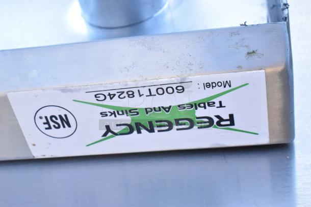 Regency table model 600T1824G with visible NSF label, stainless steel, featuring an under shelf, minor surface wear.
