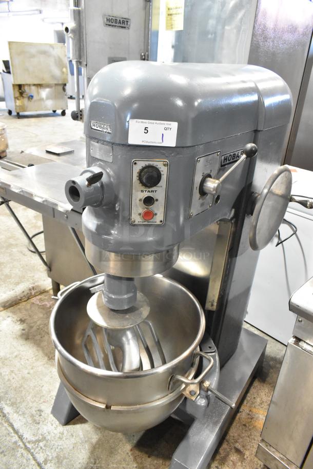 Hobart H 600T 60 Qt Commercial Dough Mixer with bowl, dough hook, and paddle. 200V, 3 phase. Good condition, sturdy design.