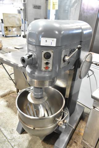 Hobart H 600T 60 Qt Commercial Dough Mixer with bowl, dough hook, and paddle. 200V, 3 phase. Good condition, sturdy design.